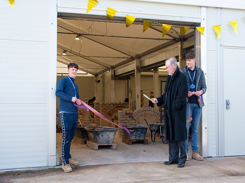 Cutting ribbon to our brickwork facility