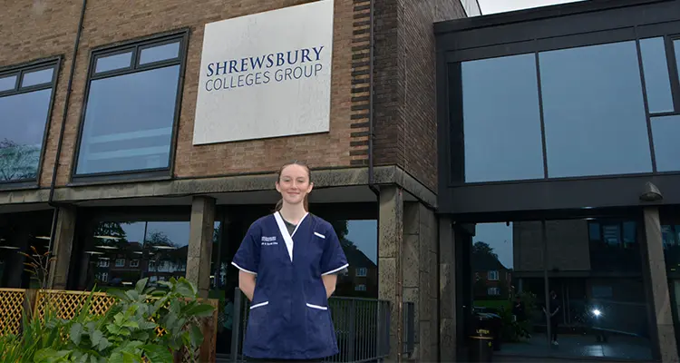 Mia Jackman standing outside London Road Campus