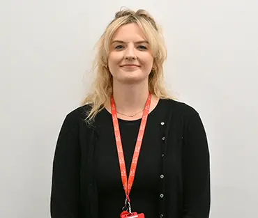 Professional head shot of female staff member smiling