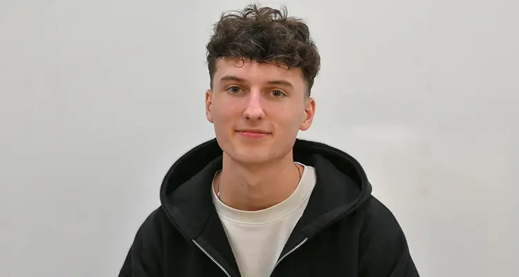 Head shot of male student smiling